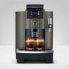 Front view of JURA W8 Dark Inox coffee machine brewing two espresso shots simultaneously.