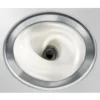Close-up of milk being frothed inside the JURA Automatic Milk Frother stainless steel container.